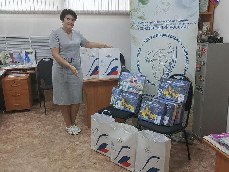 Активистки Томского регионального отделения Союза женщин России помогли собрать детей Приазовья в школу