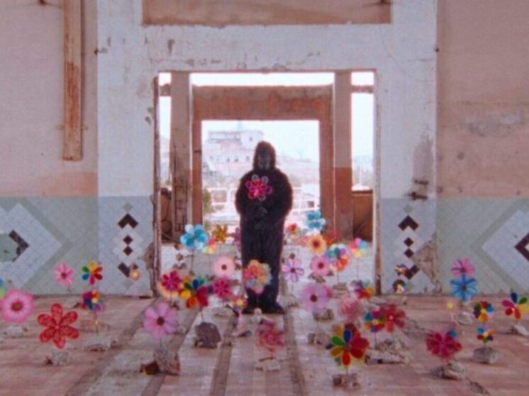 Still from `Memory` by Vladlena Sandu, showing a child`s silhouette against a stark landscape.