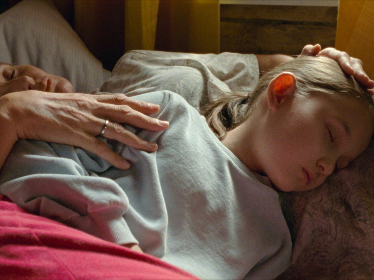 A still from `Short Summer,` Nastya Korkia`s debut film, showing an 8-year-old girl in a rural setting.