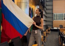 Супруга спортсмена Анастасия Шубская опубликовала в социальных сетях фотографию с государственным флагом России, сделанную в Вашингтоне