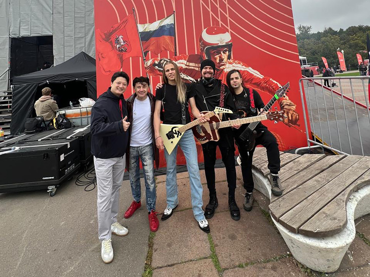 Gorky Park band members on stage with instruments