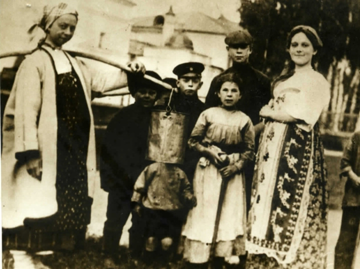 First photo of Sergei Yesenin in a group of villagers.