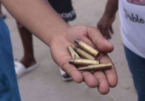 Бразилия продолжает переживать шок после самого смертоносного полицейского рейда в фавелах Рио-де-Жанейро