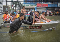 На Филиппинах объявлено чрезвычайное положение после того, как число жертв тайфуна "Калмаеги" превысило 100 человек