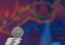 Курс доллара и евро к рублю, несмотря на приближение традиционно не слишком благоприятного для российской нацвалюты декабря, продолжает снижение