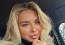 36-летняя российская синхронистка Анжелика Тиманина показала платье, в котором будет блистать в новогоднюю ночь. Олимпийская чемпионка будет сверкать в золотом наряде.
