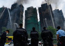 Власти Гонконга предупреждают о "внешних силах", которые пытаются использовать пожар в жилом комплексе в своих целях