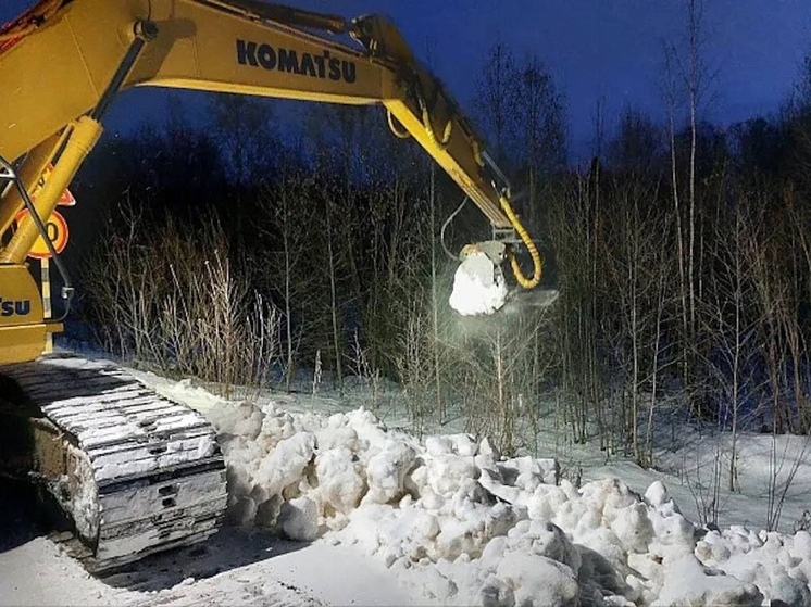 В Каргопольском округе асфальтируют участок дороги до Карелии