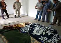 Обнародована видеозапись похорон Каддафи