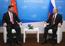 Путин встретился с председателем Китая у французского флага