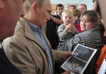 Путин поцеловал «затопленного» мальчика и чуть не подвергся атаке ножницами
