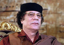 Каддафи меж огней