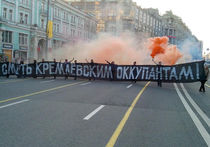 В Москве 9 мая прошла акция: активисты с баннером "Смерть кремлевским оккупантам" перекрыли Тверскую