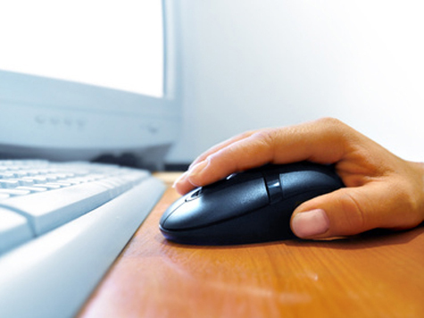 Клик компьютерной мыши в Интернете могут приравнять к подписи в договоре