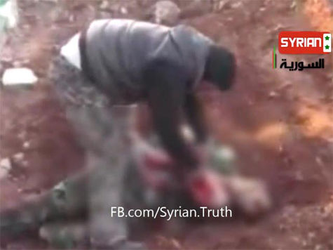 В сеть попали кадры из Сирии, на которых оппозиционный военный занимается каннибализмом

