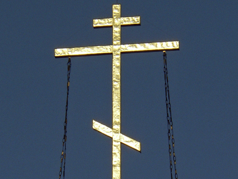 Верующие меняют логотип с надкушенным яблоком на крест