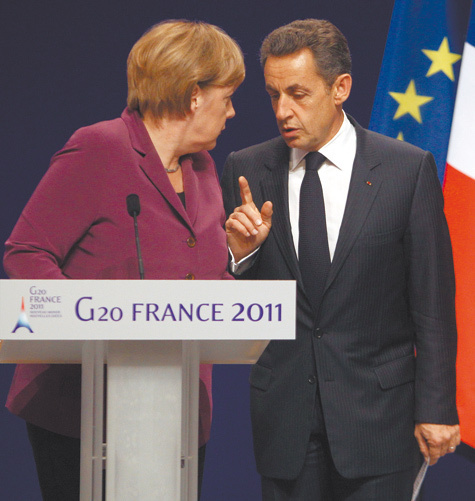 Саркози и Меркель грозят исключением нерадивым членам ЕС
