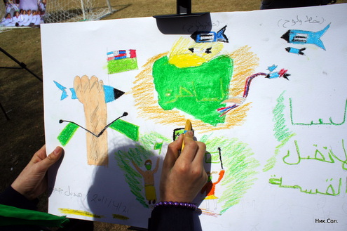Почему ливийские дети рисуют войну, а не оранжевого верблюда?