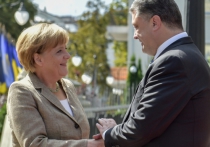 Меркель пообещала Порошенко полмиллиарда на Донбасс и новые санкции против РФ