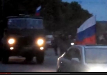 Местные чиновники и националисты в Киеве утверждают, что это донские казаки - до Ростова всего 100 километров, "граница дырявая"