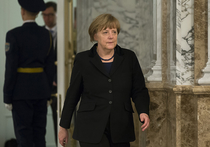 Канцлер Германии Ангела Меркель, как и коллеги по "нормандской четверке", вскоре после завершения многочасовых переговоров сделала первые краткие заявления для прессы