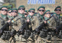 Порошенко провел военный парад в Киеве и запретил отмечать 23 февраля