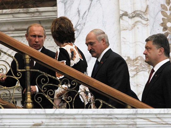 Российские и украинские политологи комментируют итоги саммита в Минске